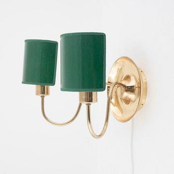 Josef Frank, a model 2565 brass wall lamp, Firma Svenskt Tenn.