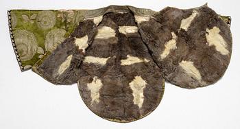 A Japanese silk brocade and fur childrens jacket, Meiji (1868-1912).