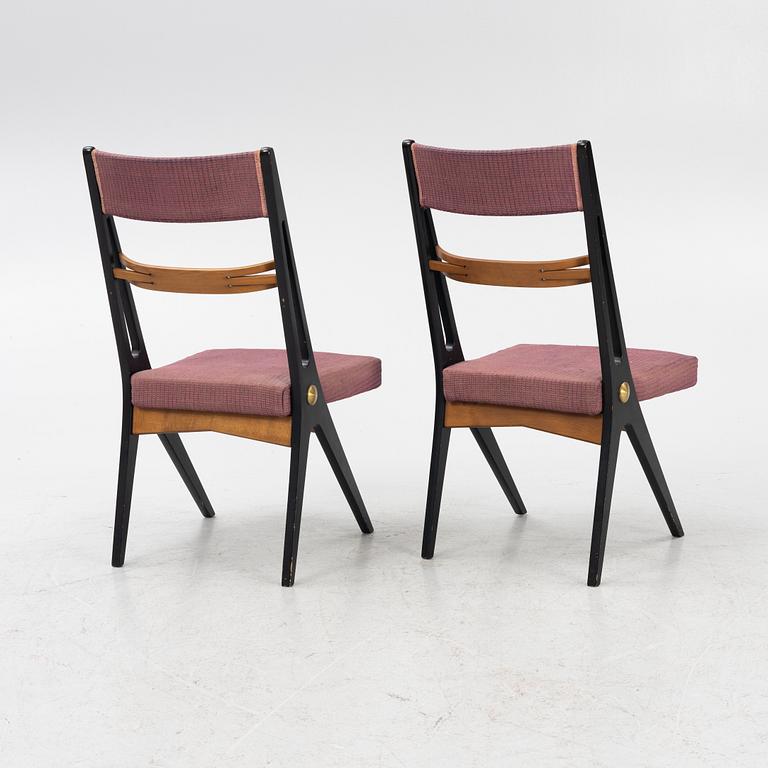 Dining table and four chairs, mid-20th century.