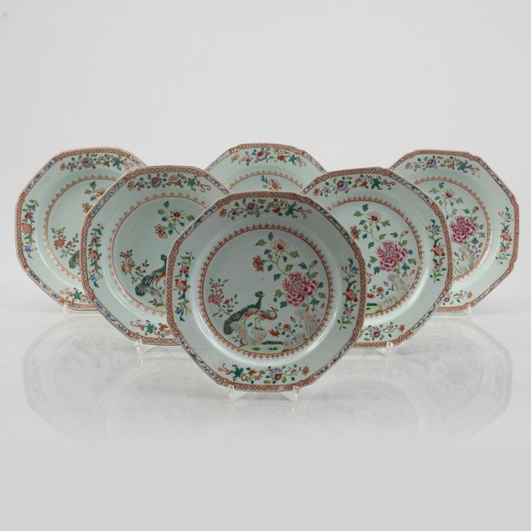 A set of seven (3+4) famille rose 'double peacock' plates, Qing dynasty, Qianlong (1736-95).