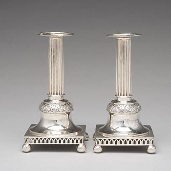 A pair of Swedish aerly 19th century silver candlesticks, mark of Carl Gustaf Blomborg, Stockholm 1815.