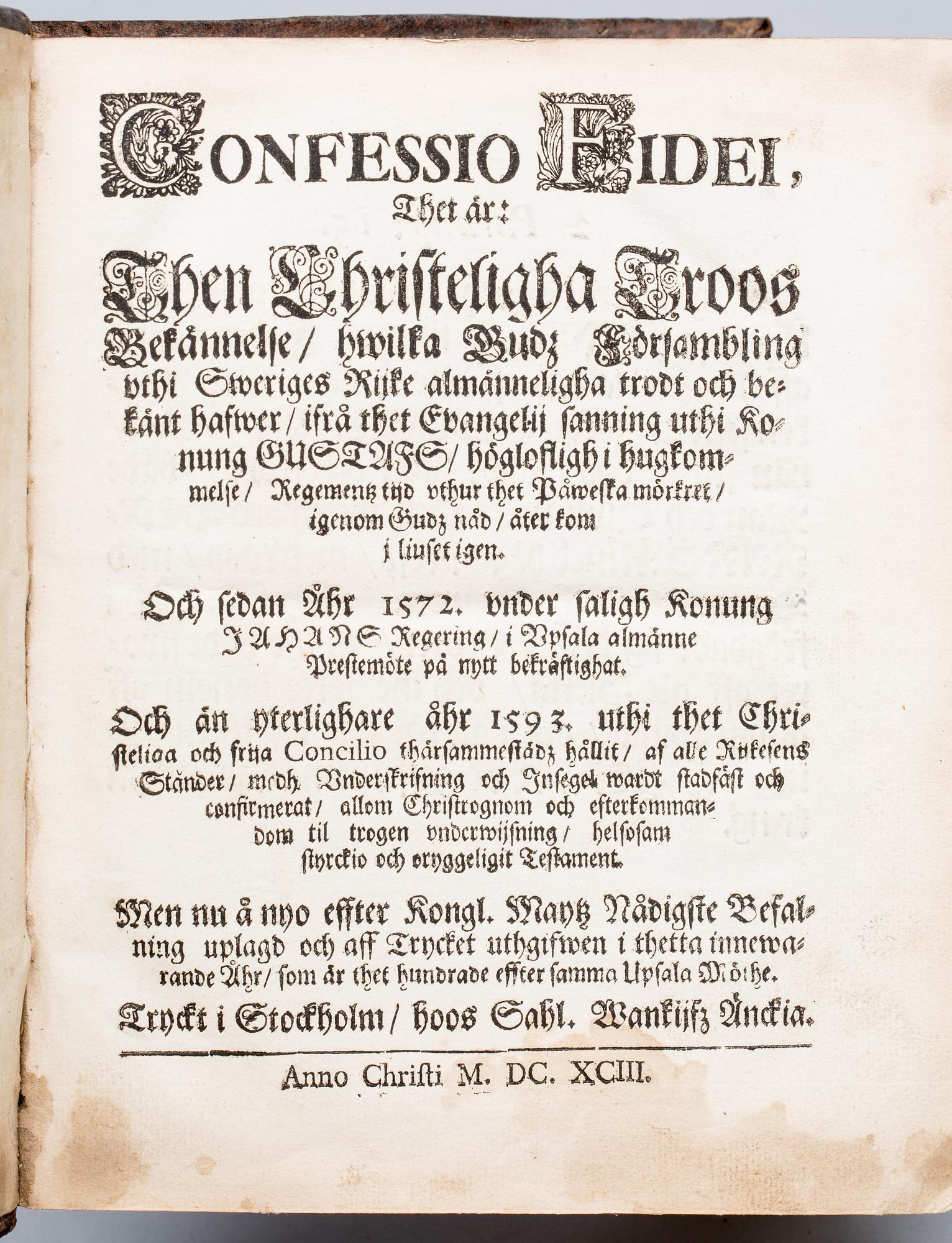 BOK, Carl XI:s pärmexlibris, "Confessio Fidei", Stockholm 1693.