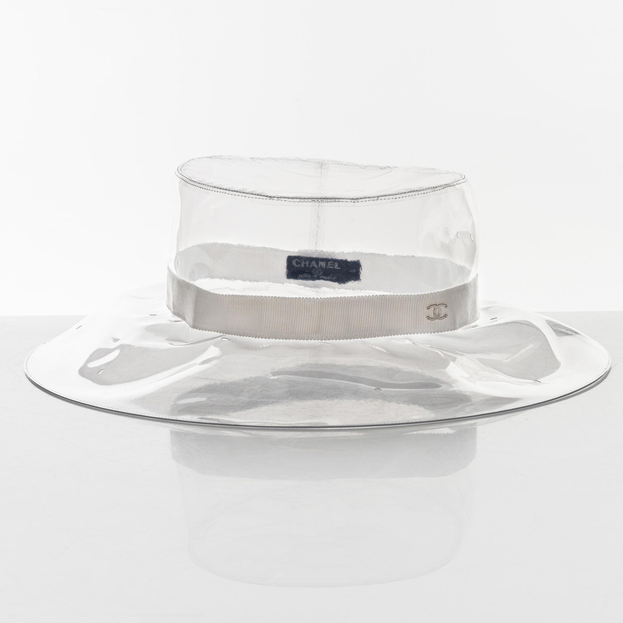 Chanel, a transparent PVC hat, size S.