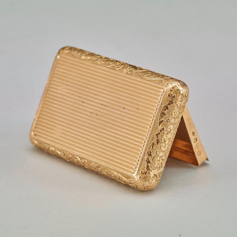 A French 19th century gold snuff-box, markes of Paris 1809-1818.