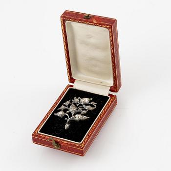 Brooch in silver set with rose-cut diamonds, 19th century.