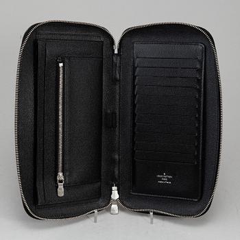 LOUIS VUITTON, an 'Atoll Ardiose' Taiga leather trave organizer, 2015.