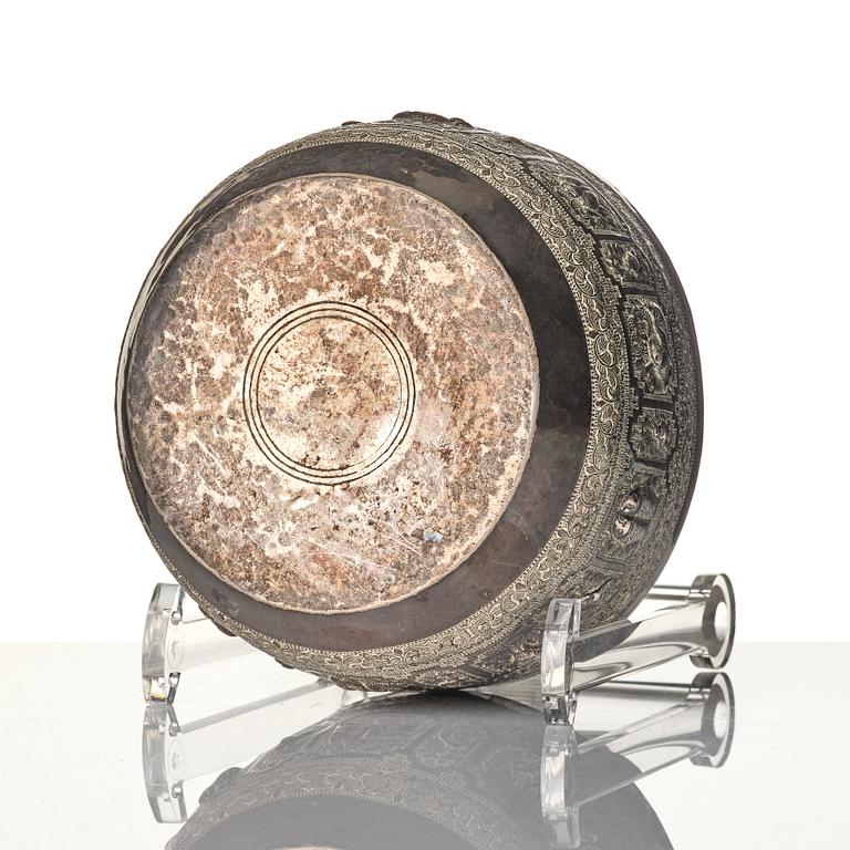 A Chinese brushpot, Qing dynasty, circa 1900. An archaistic bronze ewer and a silvered South East Asian bowl with stand.