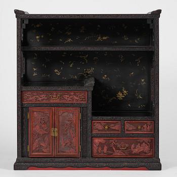 A lacquer display cabinet, late 19th century.