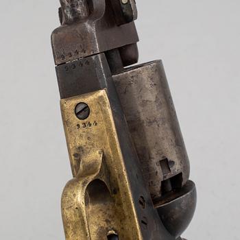 A Colt Dragoon percussion revolver no 9344 manufactured 1850.