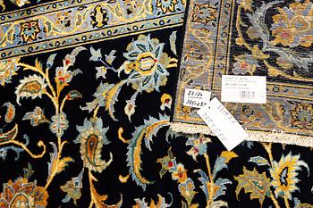 A Kashan carpet, c. 385 x 287 cm.