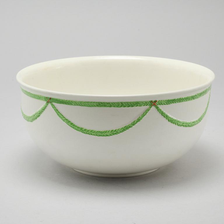 A 20th century set of earthenware tableware of 21 pcs by Gustavsberg.