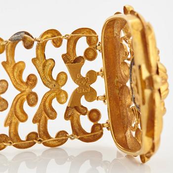 A pair of 19th century 18K gold bracelets.