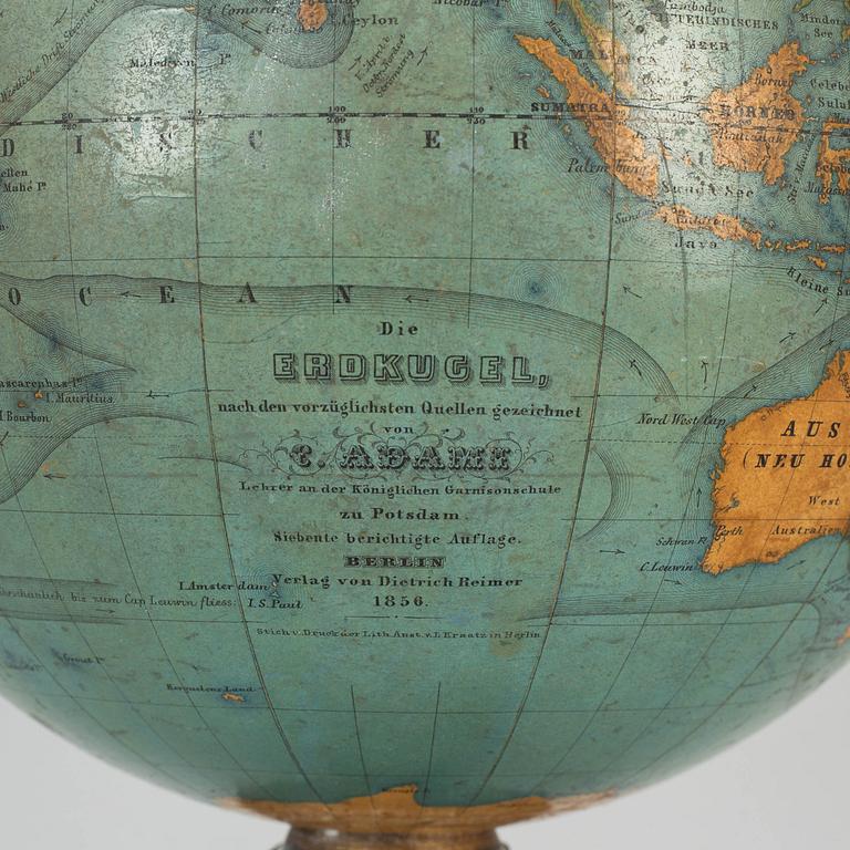 A miniature terrestrial globe, marked Adami Berlin Verlag von Dietrich Reimer 1856,