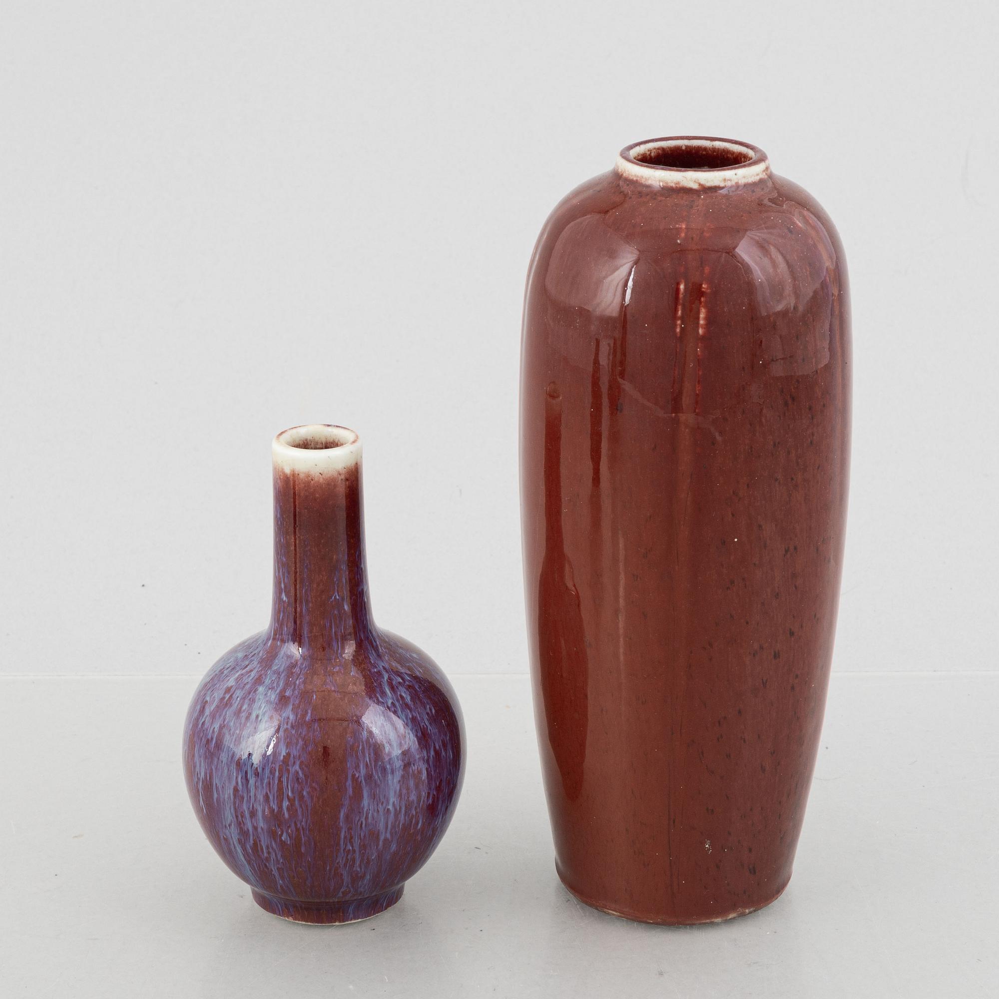Four oxblood glazed porcelain vases, China, 20th century.