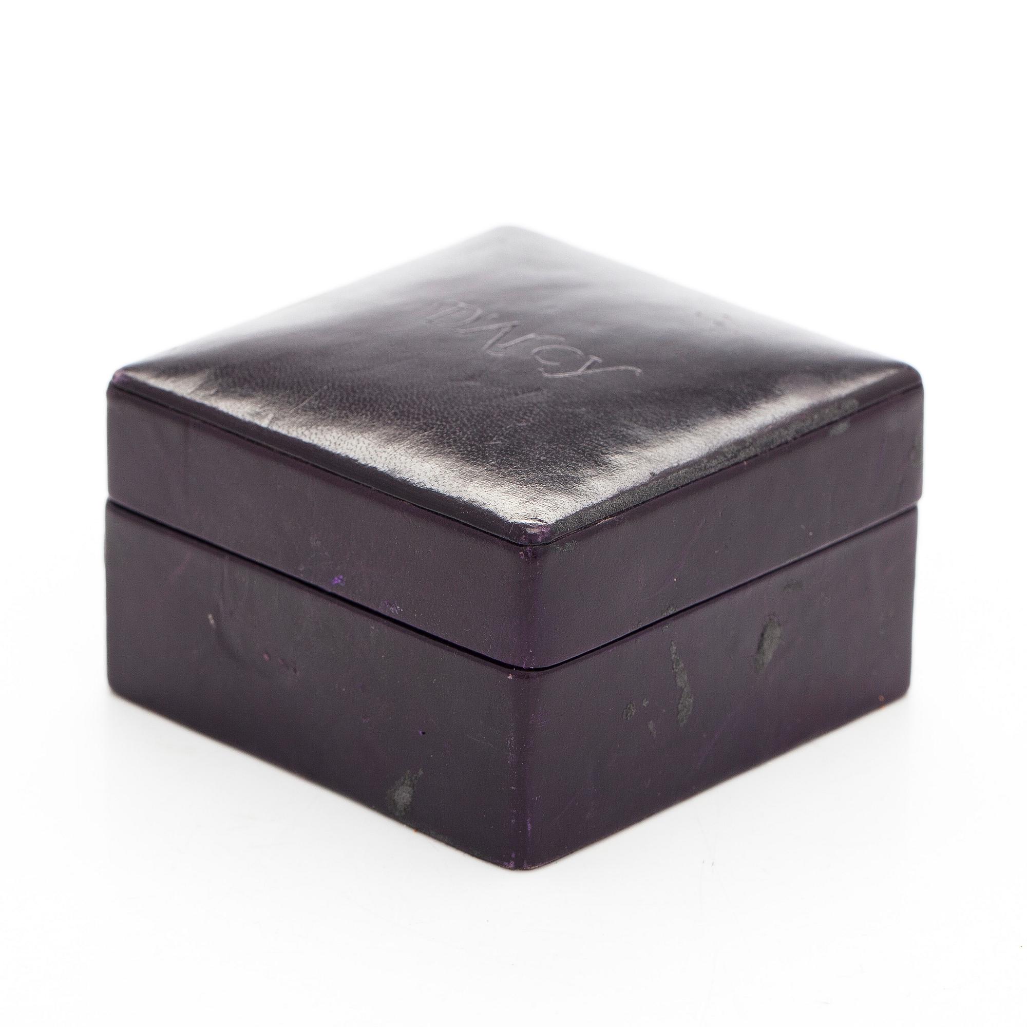 Earrings, diamonds, black stone and pearls.