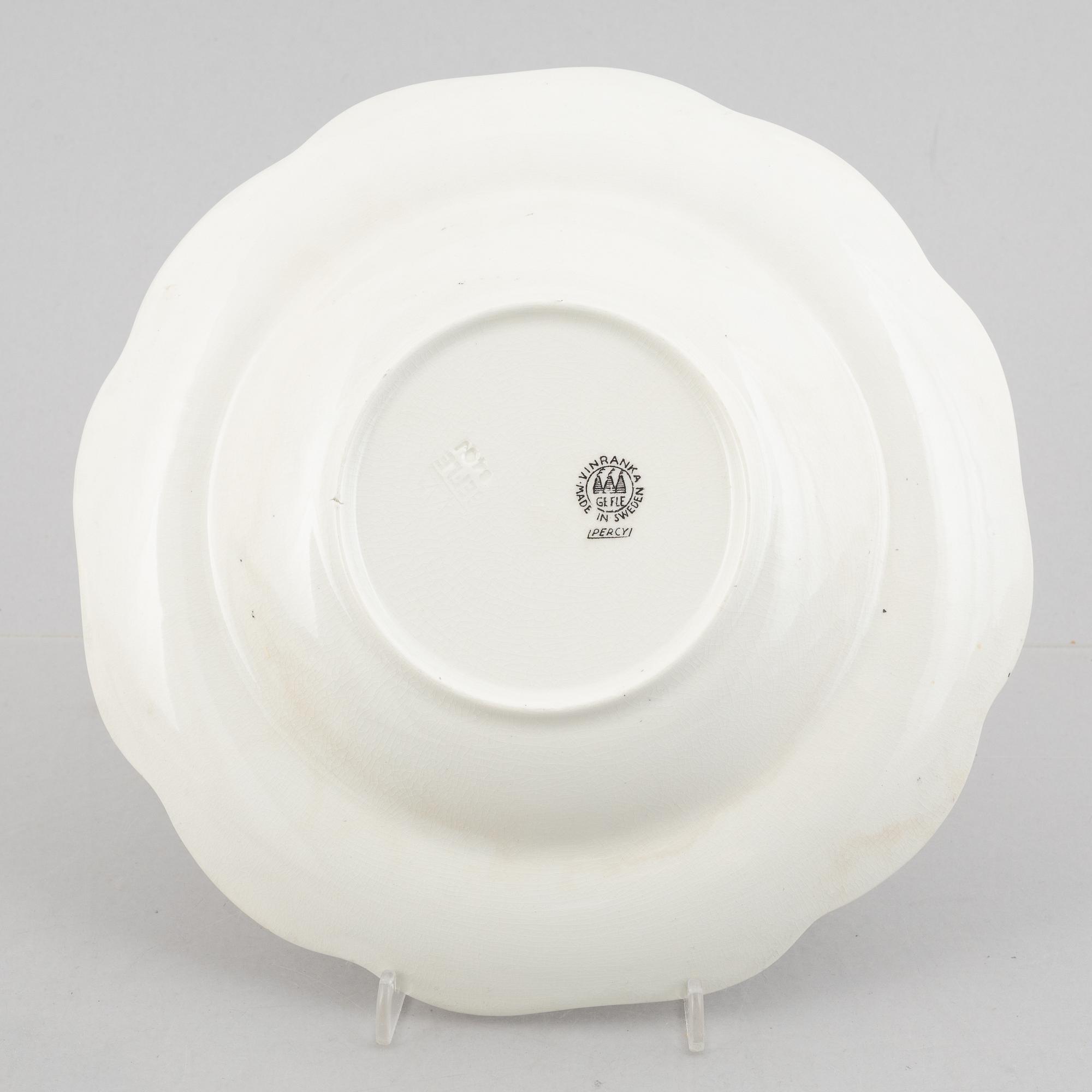 Arthur Percy, 57 pieces of a "Vinranka" creamware service, Gefle, Sweden, first half of the 20th century.