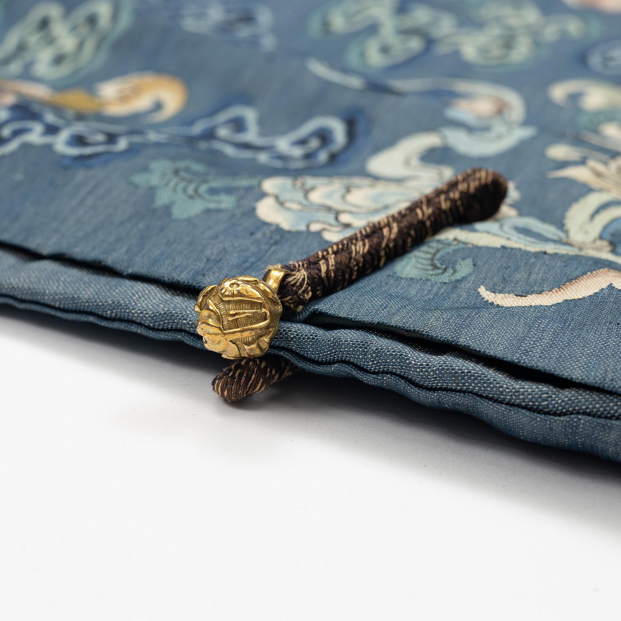 An imperial blue kesi summer robe, Jifu, Qing dynasty, 1830's.