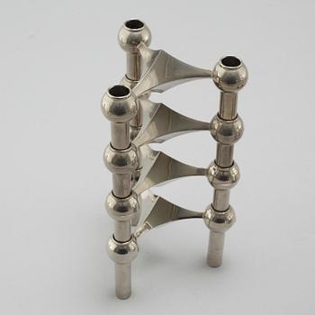 A metal candlestick with eleven parts by Ceasar Stoffi and Fritz Nagel, second half of the 20th century.