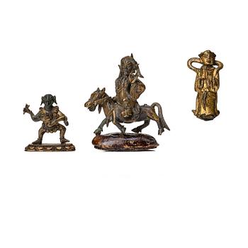 A group of three bronze miniatures sculptures of deities, China and Tibet, 18th Century.