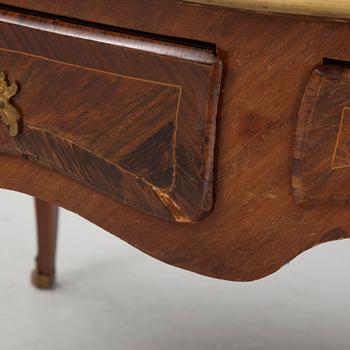 A French Louis XV-style rosewood marquetry 'Bureau plat aux bustes de femmes", late 19th century.