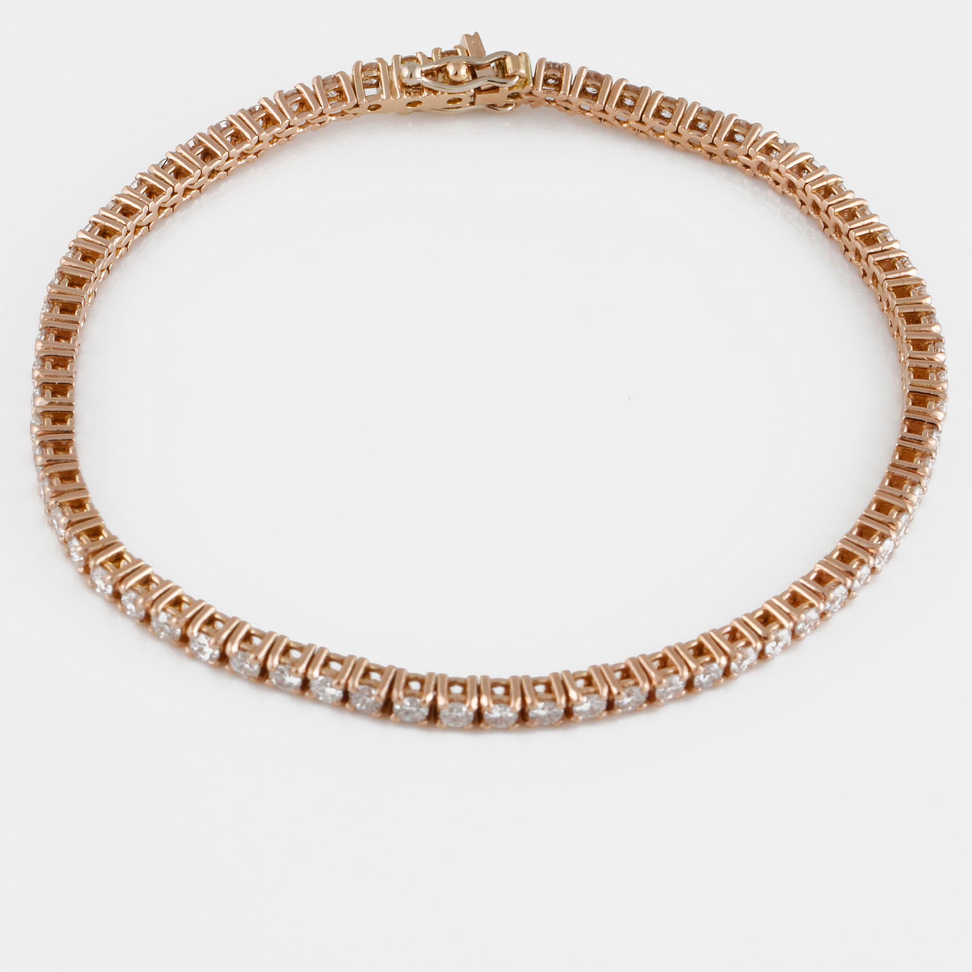 ARMBAND, 18K roséguld med briljantslipade diamanter ca 2.99 ct. Vikt 9,9 gram.