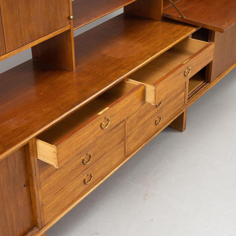 Josef Frank, a mahogny sideboard with cabinets, shelves, writing flap and drawers, Svenskt Tenn, a special commission, 1940-50s.