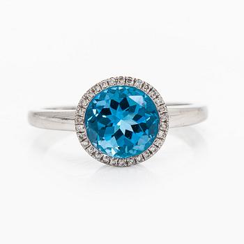 Ring, fasettslipad topas, åttkantslipade diamanter, 18K vitguld.
