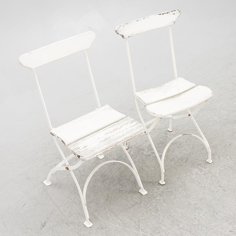A set of seven garden chairs and two tables Byarums bruk, later part of the 20th century.