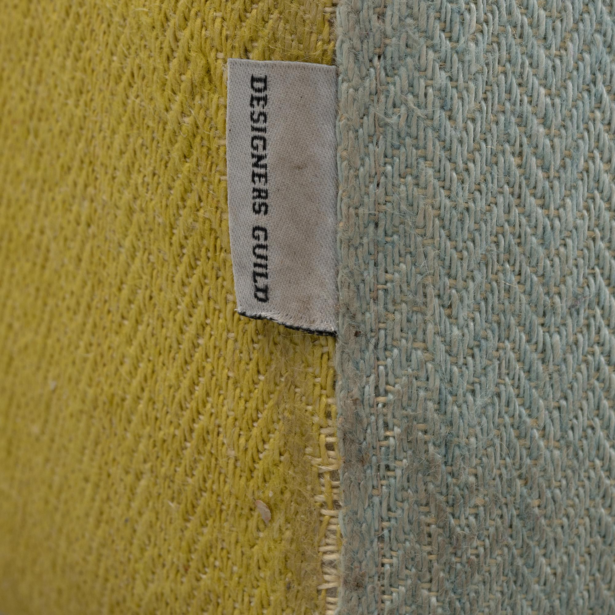 An armchair, Designers Guild Furniture, England.