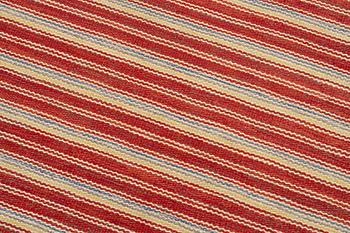 A flat weave carpet, c. 256 x 158 cm.