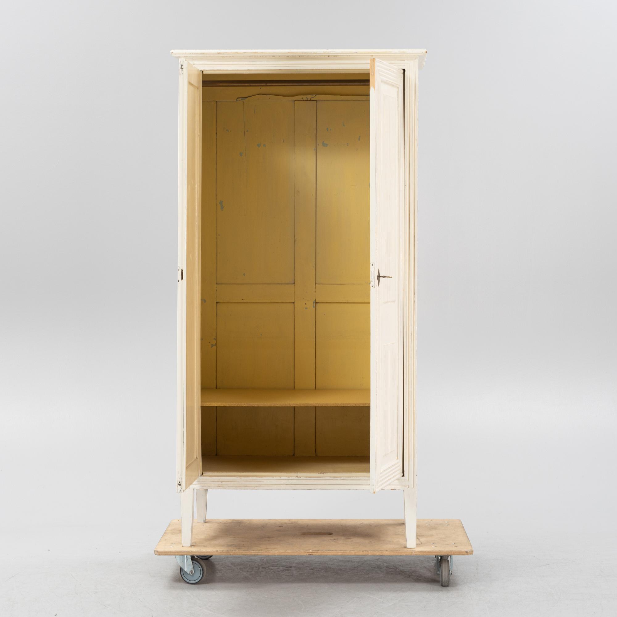 A Gustavian style cabinet, early 20th Century.