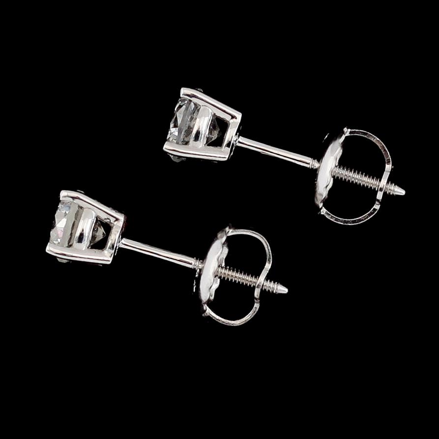 ÖRHÄNGEN, 1 par, 14K vitguld, briljantslipade diamanter tot ca 0.63 ct.