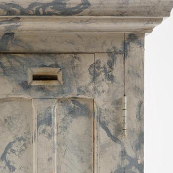 A Swedish column-shaped cabinet late 19 th century.