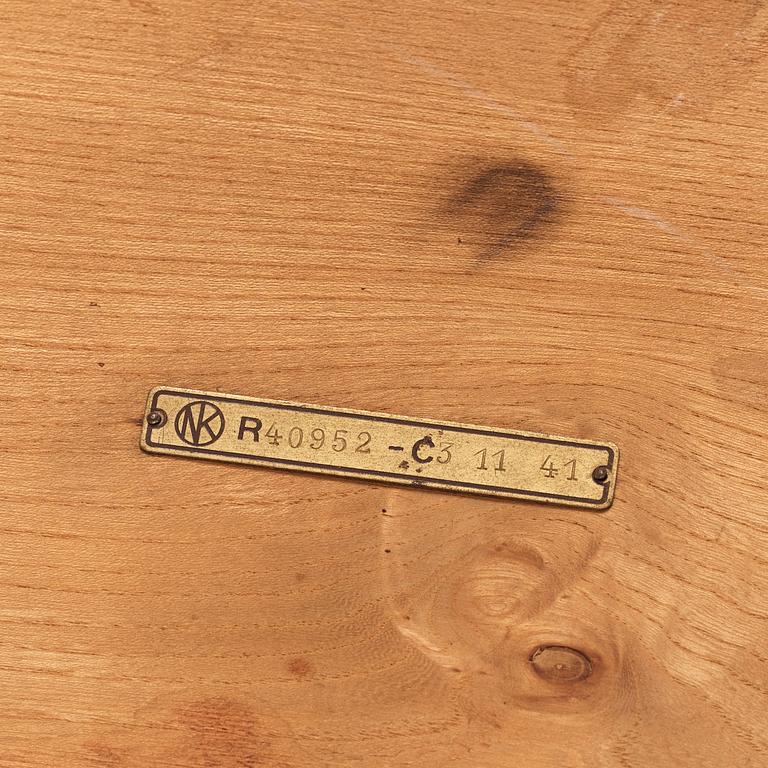 Axel Einar Hjorth, a 'Dagmar' elm veneered table, Nordiska Kompaniet, Sweden, 1941.