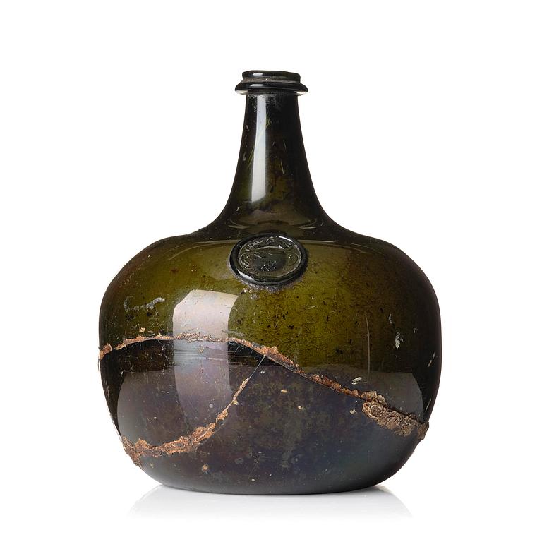 A large armorial wine bottle, Skånska glass manufactory, Henrikstorp, 18th century.