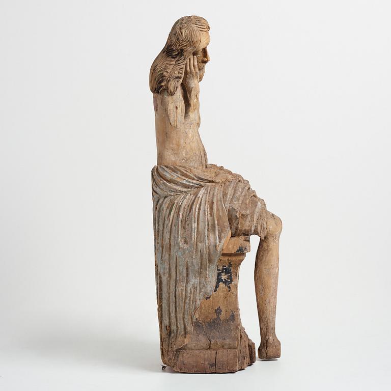 An late 15th century and around year 1600 carved wood sculpture.