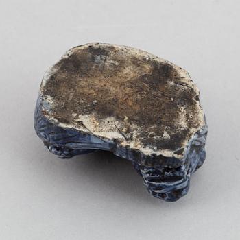 A blue glazed figure of a buddhist lion, Qing dynasty, Qianlong (1736-95).