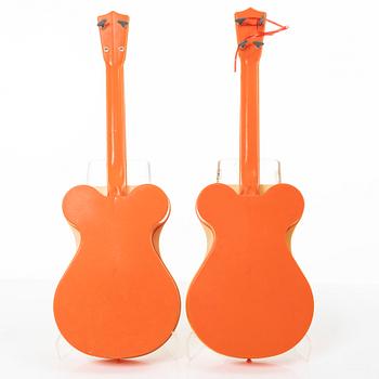 The Beatles, "New Sound Guitar", toy guitars, 2 pcs, Selcol Products Limited, England. 1960s.