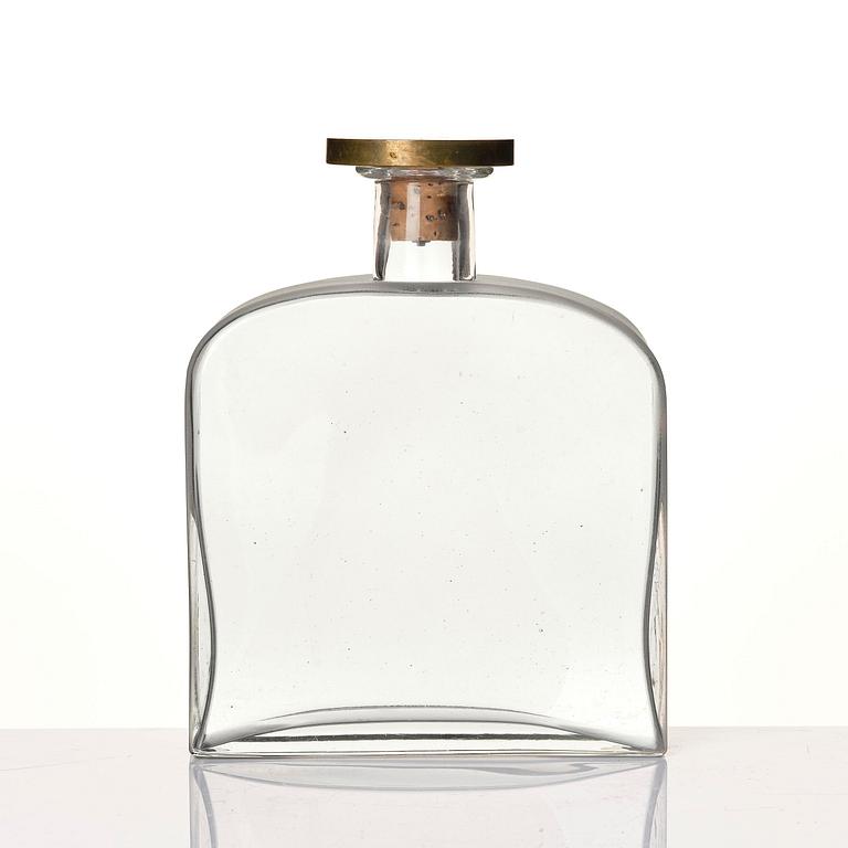 Firma Svenskt Tenn, a glass bottle model A 1608, with a pewter and brass stopper by Björn Trägårdh, Stockholm, 1930s.