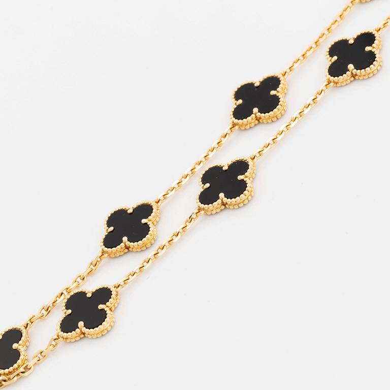 A Van Cleef & Arpels "Alhambra" necklace in 18K gold and onyx.