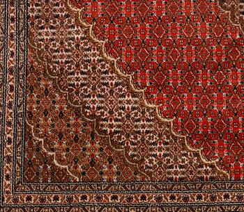 A carpet, Tabriz, part silk, 40-50 Radj, ca 300 x 195 cm.