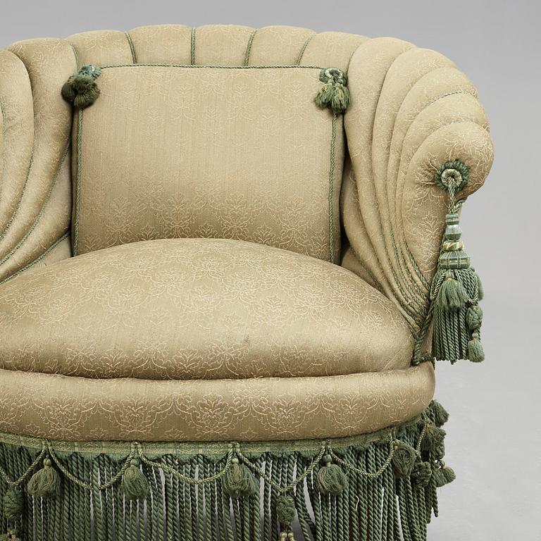 A pair of easy chairs, circa 1900.