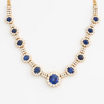 Necklace in 18K gold with eleven faceted sapphires and round brilliant-cut diamonds.