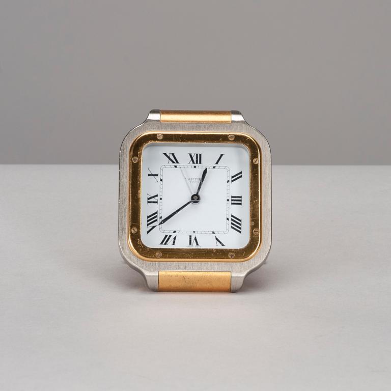 A CARTIER TABLE CLOCK, steel with gidt decoration, late 20th century.