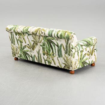 A model 703 sofa by Josef Frank for Firma Svenskt Tenn.