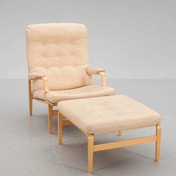 FÅTÖLJ samt FOTPALL, "Ingrid", Bruno Mathsson, Dux, brännmärkt.