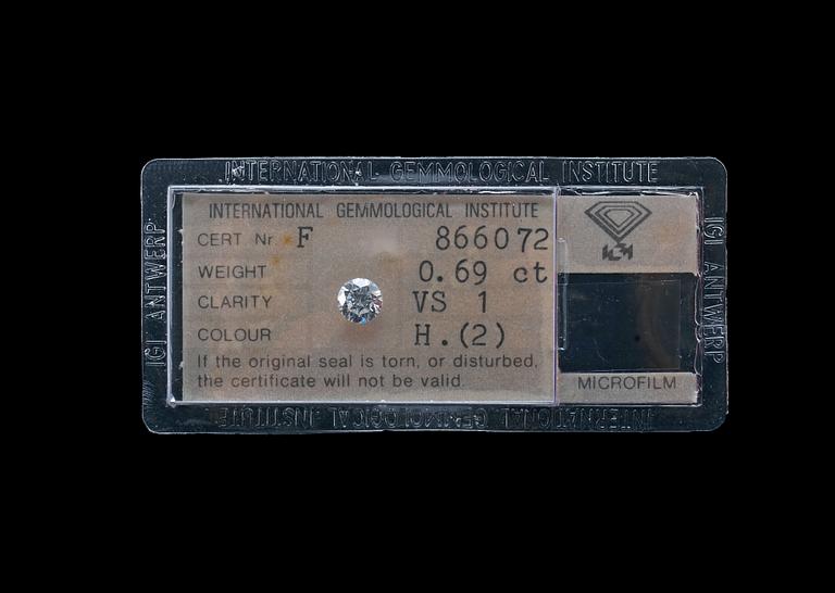A DIAMOND, brilliant cut 0.69 ct. H/vs1 . IGI certificate 1980.
