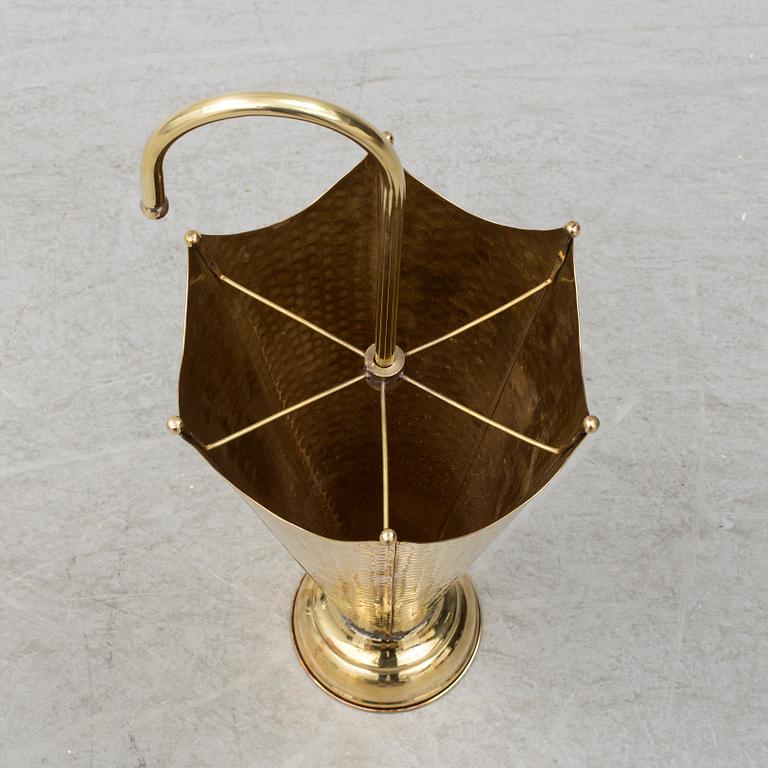 A brass umbrella stand.