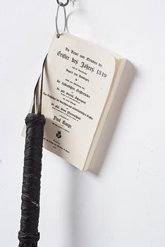 Per-Oskar Leu, signed with stamp and dated 2009. Numbered 7/33. Leather, metal and book.