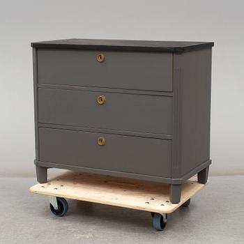 a mid 20th century gustavian style chest of drawers.